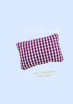 Le coussin de lecture et/ou de voyage